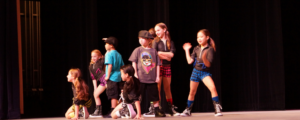 Dancers performing hip hop on stage