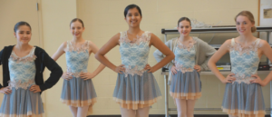 Girls wearing blue ballet costumes