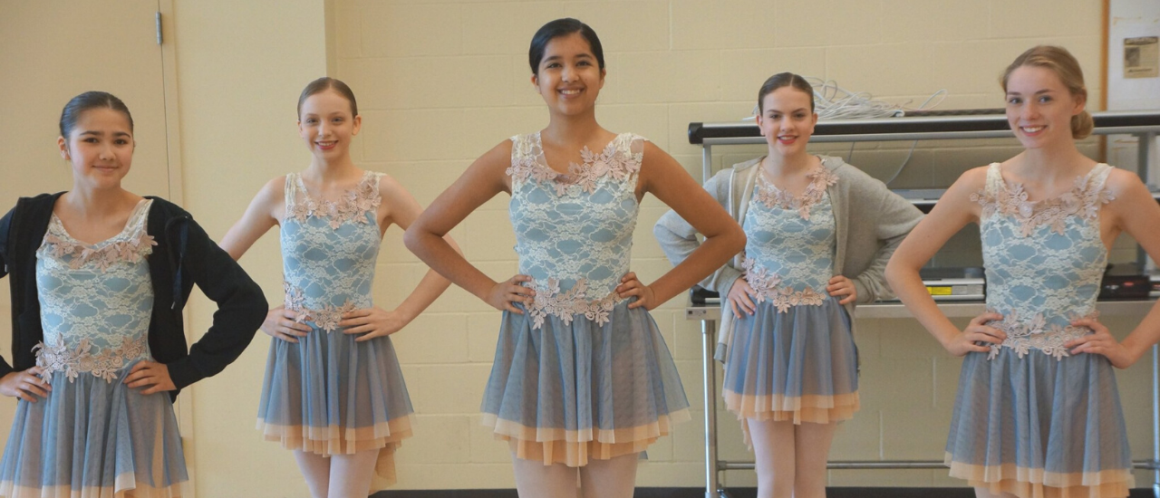 Girls wearing blue ballet costumes